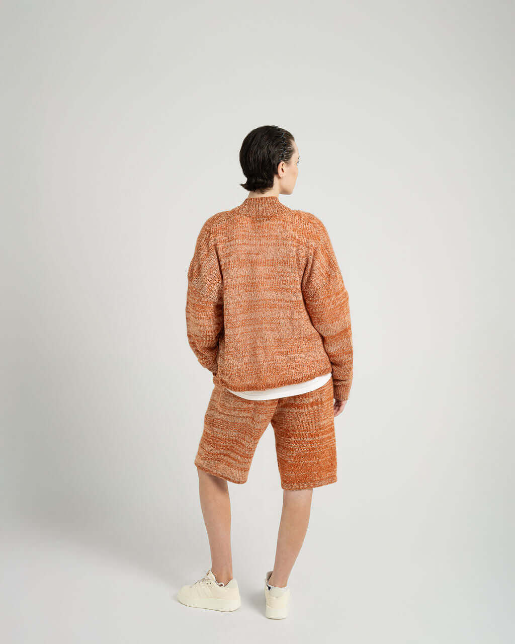 Kid Mohair blend knitted shorts and sweater in sunset orange, featuring relaxed fit and textured yarn.